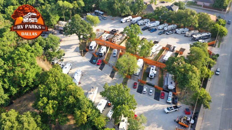 Aerial view of gated RV sites with wood privacy fences at Dallas Shady Oaks RV Park