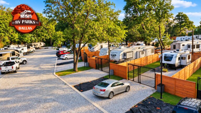 Low aerial view of premium gated RV sites with wood privacy fences at Dallas Shady Oaks RV Park